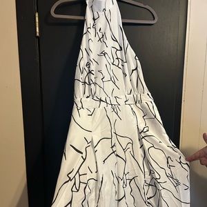 Never worn women’s jumpsuit. Very soft and flowy